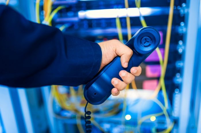 Engineer holding phone